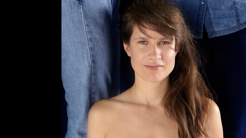 The singer Camille looking at us.