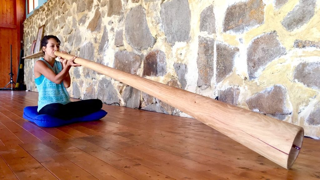 A didgeridoo player playing